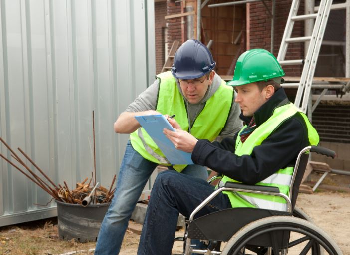 Job Safety Analysis, disabled trainer evaluating a worker