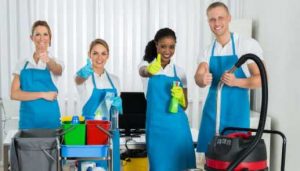 Cleaning team giving the thumbs up for the camera