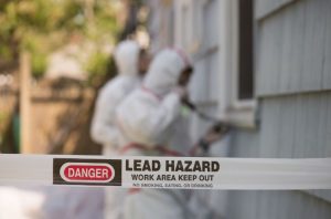 warning signs for lead around a construction project