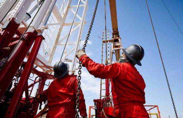 workover crew on the rig floor