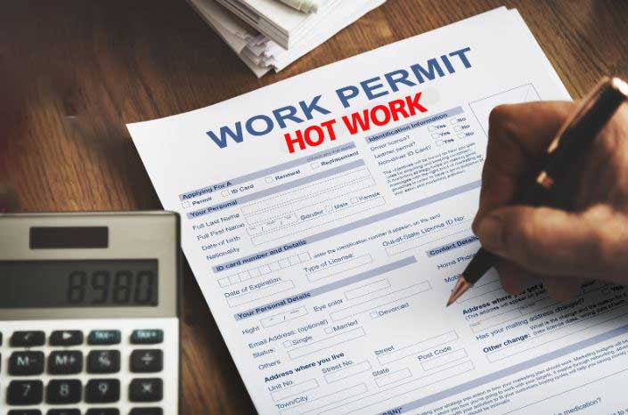 filling out a work permit form