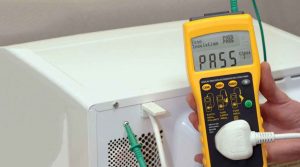 testing electrical conformity of a microwave using a handheld tester
